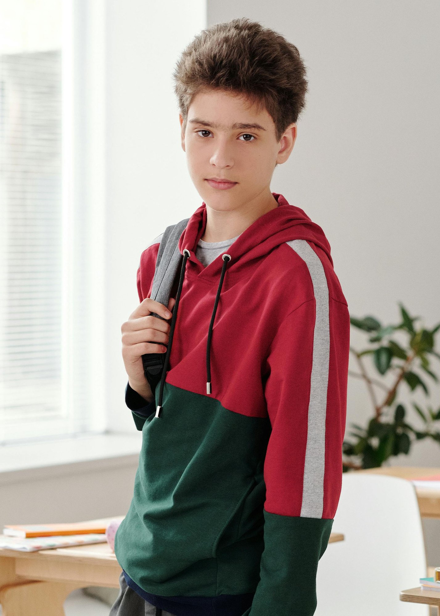 Middle school aged boy with backpack